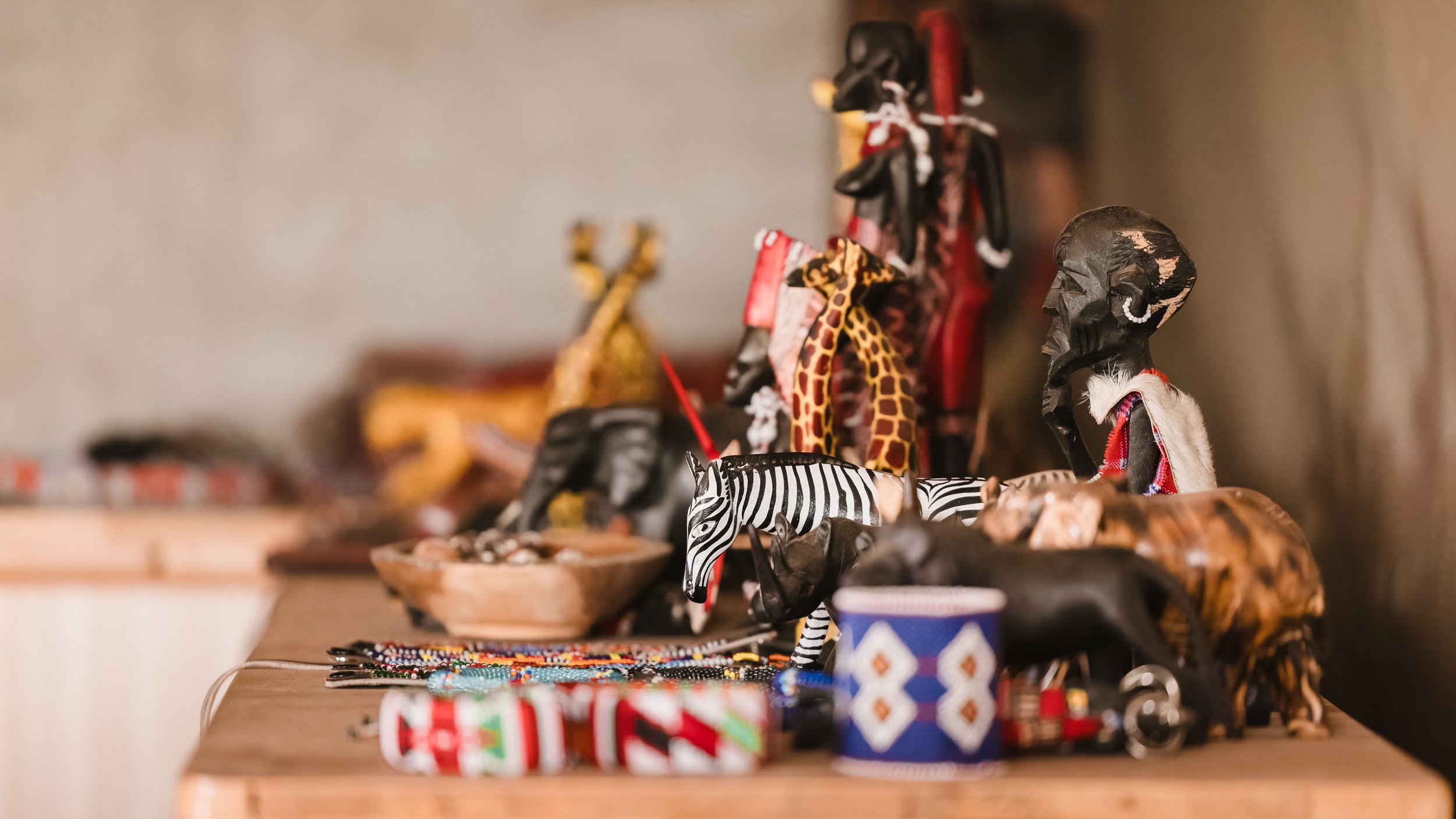 Authentic Maasai beadwork and carved animal figures at the Enkoropil curio shop
