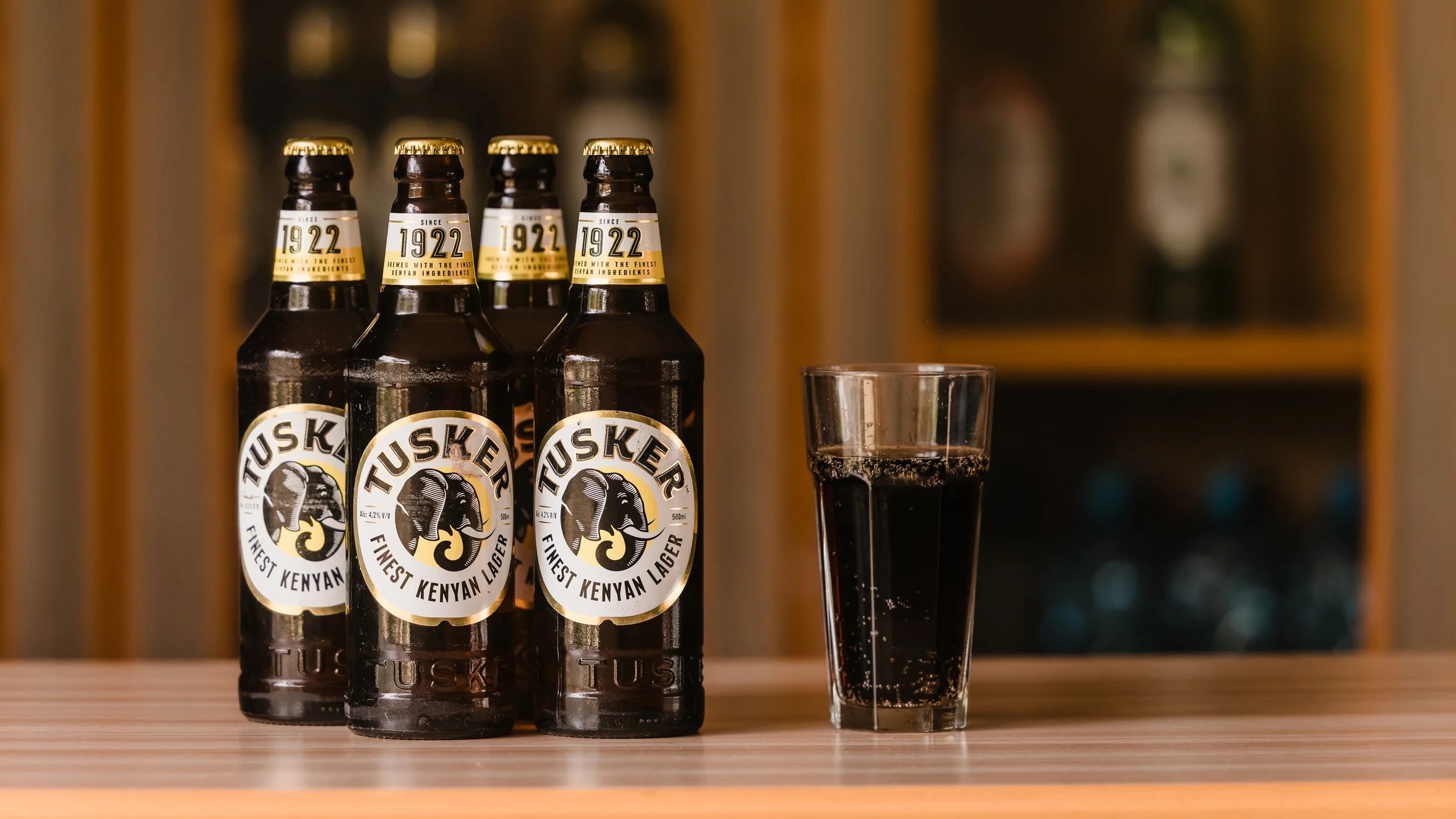 Tusker lager — Kenya's finest, served cold at the Enkoropil camp bar